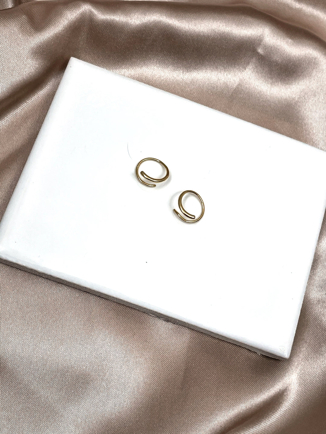 Talia Twist Huggie Hoop